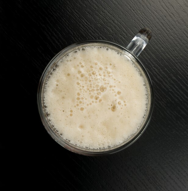 Frothy Beer in Glass Mug