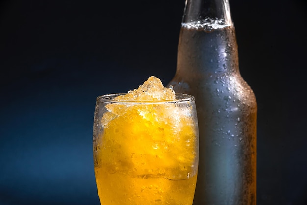 Frozen beer slushie cocktail in a glass close up