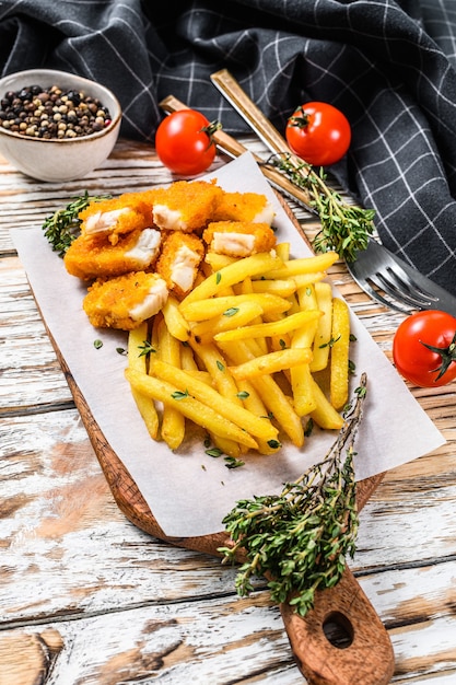 Frozen fish fingers on the table