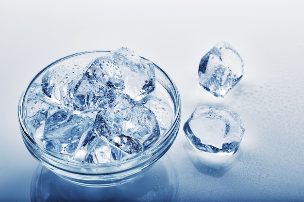 Frozen ice cubes in  glass plate