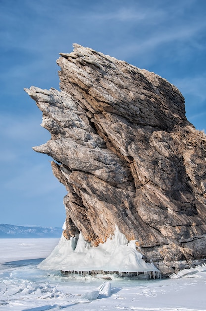 Frozen lake and rocks near the ice cave