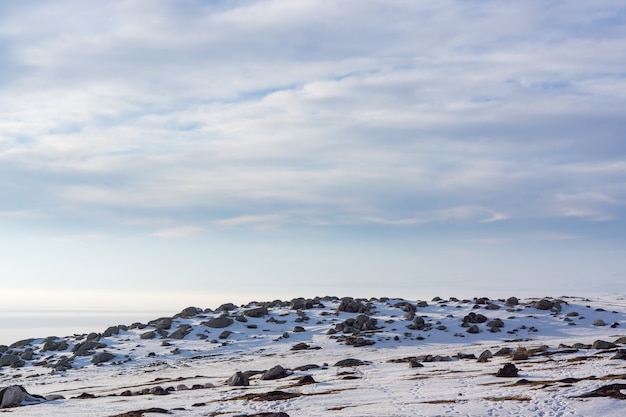 Frozen Lake with rocks in the winter. Kars - Turkey