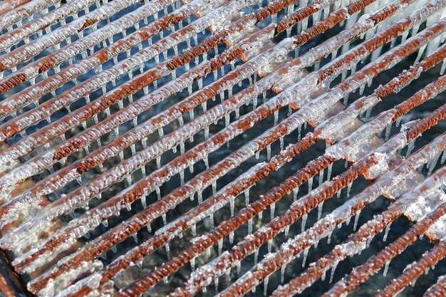 frozen metal grating Closeup Abstract background