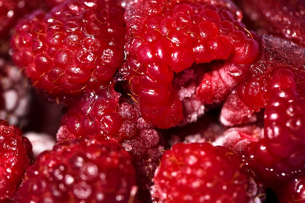 Frozen raspberries background