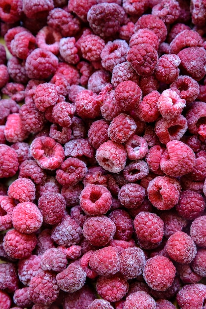 Frozen raspberry close up