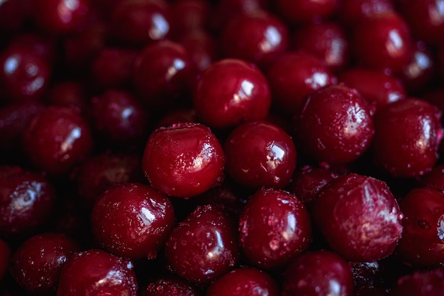 Frozen red cherry Juicy ripe berry View from top Background full frame