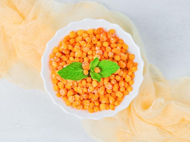 Frozen sea buckthorn with mint