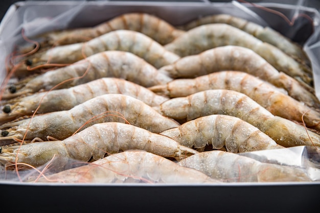 frozen shrimp raw gambas seafood prawn meal food snack on the table copy space food background