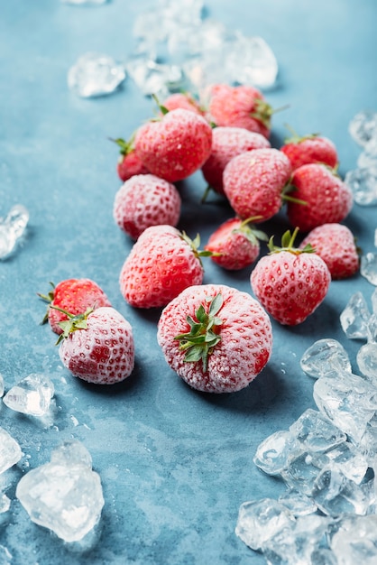 Frozen strawberry with crystals of ice