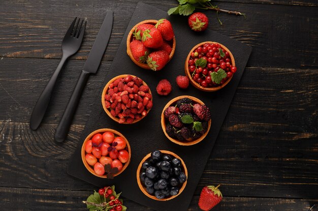 Fruit and berry tartlets dessert tray assorted