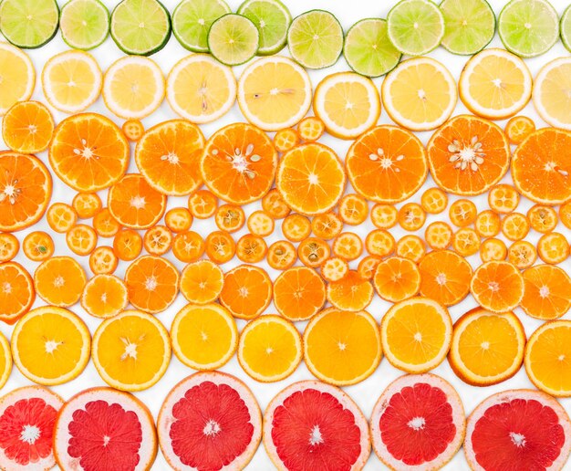 Fruit citrus background with grapefruit orange tangerine lemon lime and kumquat Top view