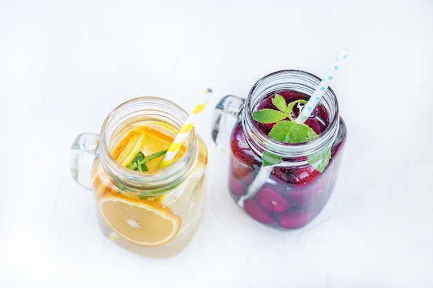 Fruit cocktail with cherries. Detox water Summer and party.