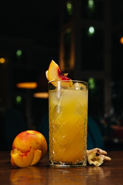 Fruit cocktail with nectarine on the table