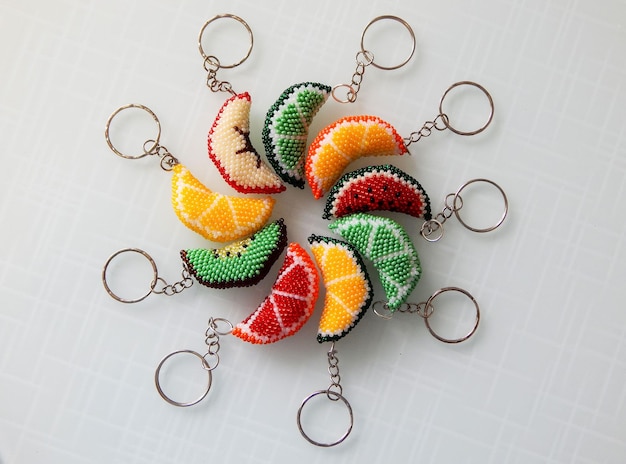 Fruit colorful key chains on a white
