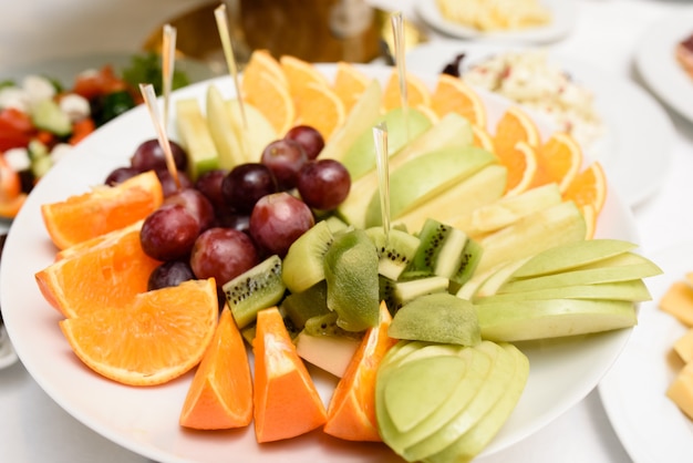 Fruit dish with various types of dessert