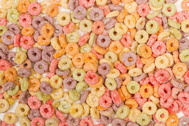 Photo fruit flavor colored cereals in a close up view