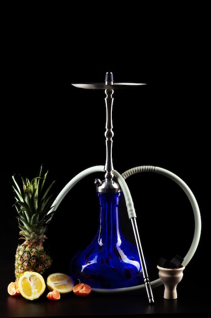 Photo fruit flavor hookah isolated on black background close up