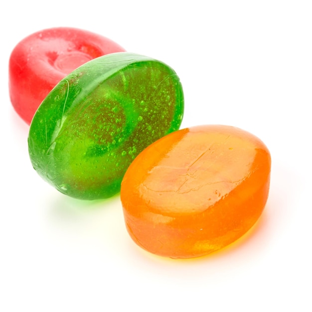 Photo fruit hard sugar candy boiled sweet or sugar plum isolated on white background cutout
