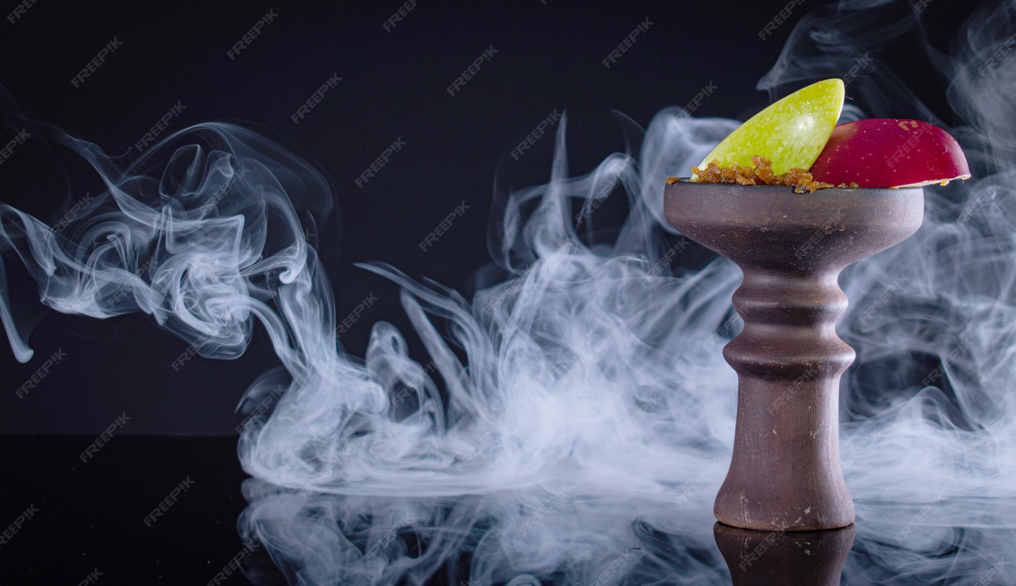 Premium Photo | Fruit hookah bowl with tobacco two apple and smoke on