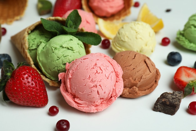 Fruit ice cream and ingredients on white background