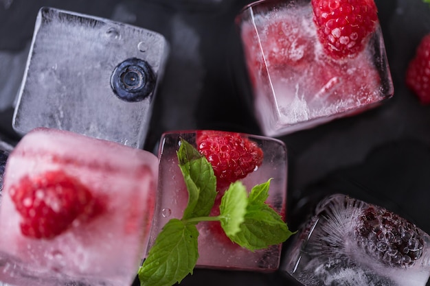 Fruit ice cubes with organic berries.