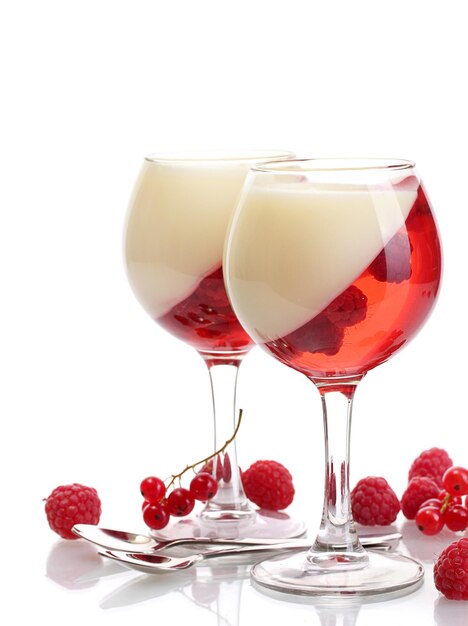 Fruit jelly with raspberries in glasses isolated on white