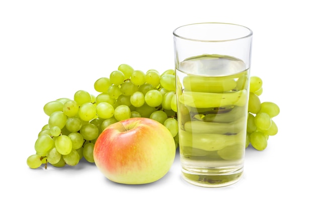 Fruit juice in glass with grape and apple on white