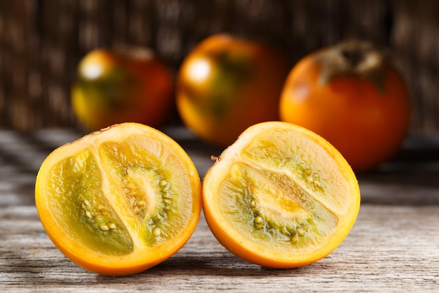 Fruit of lulo or naranjilla on wood