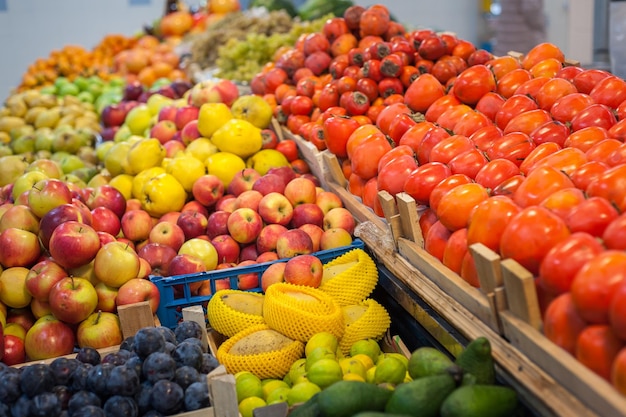 Fruit market with various colorful fresh fruits and vegetables