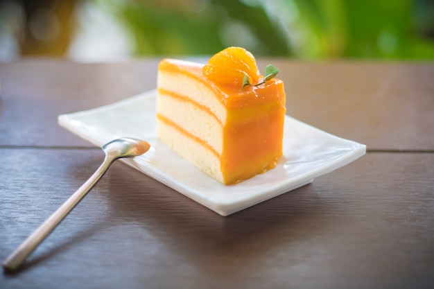 Photo fruit orange jam cream cake