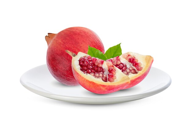 Fruit pomegranate isolated on white plate isolated