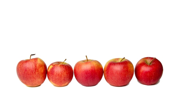 Fruit red apples on a white background