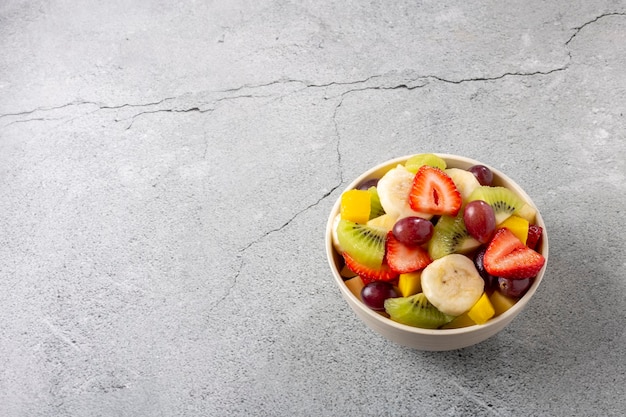 Fruit salad in bowl on the table