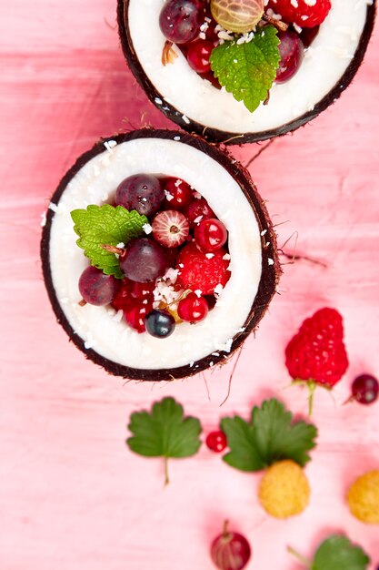 Fruit salad in coconut shell bowl