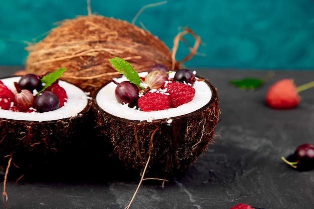 Fruit salad in coconut shell bowl