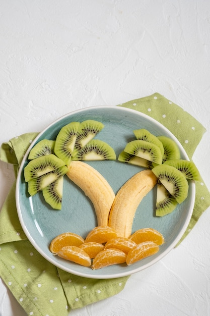 Fruit salad in the shape of palm trees