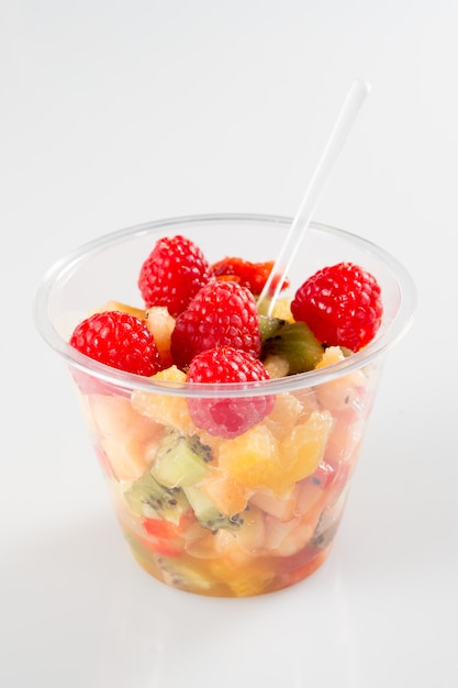 Fruit salad in takeaway clear plastic cup