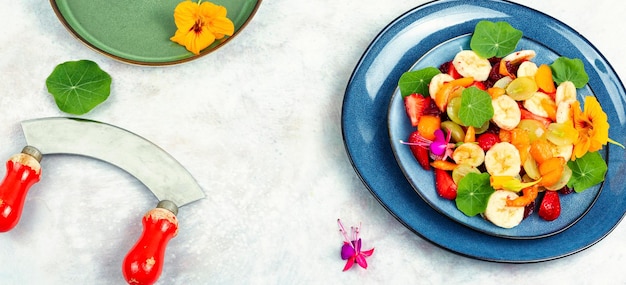 Fruit salad with nasturtium