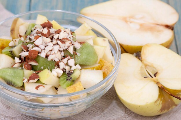 Photo fruit salad with pears and kiwi fruit