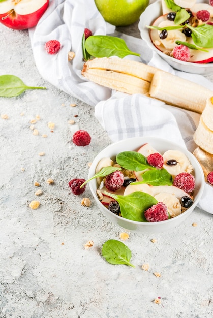 Fruit salad with spinach and granola