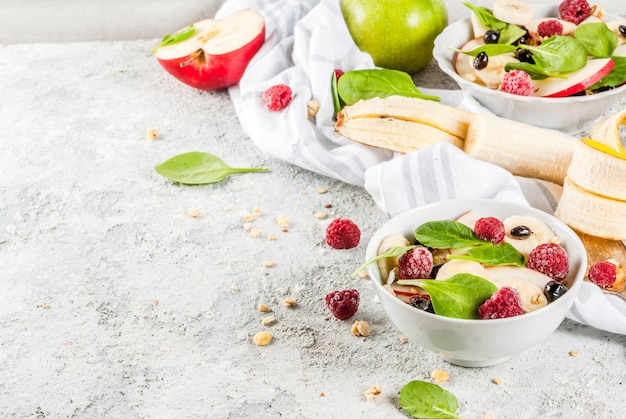 Fruit salad with spinach and granola