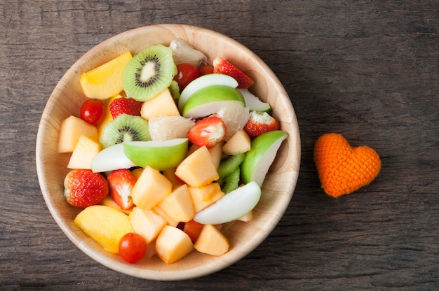 fruit salad on wood table