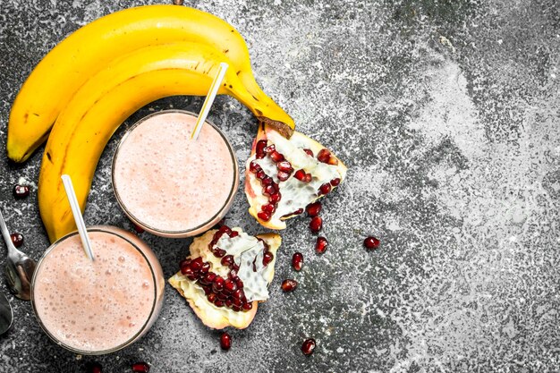 Fruit smoothie in glasses. on rustic background