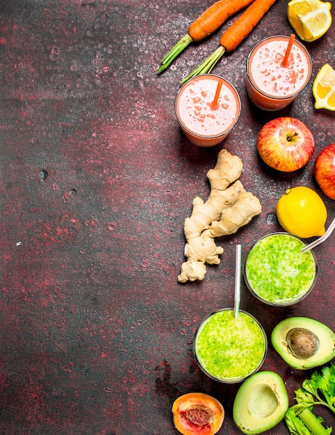 Fruit smoothies on rustic background