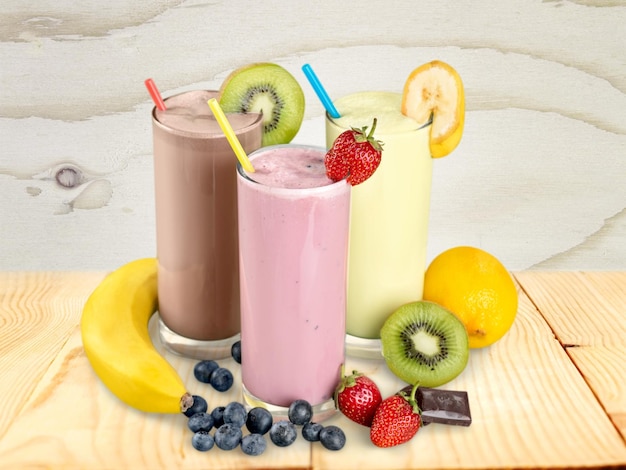 Fruit Smoothies with Straws  Isolated on a White Background