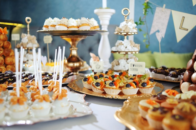 fruit tartlets on a golden tray.