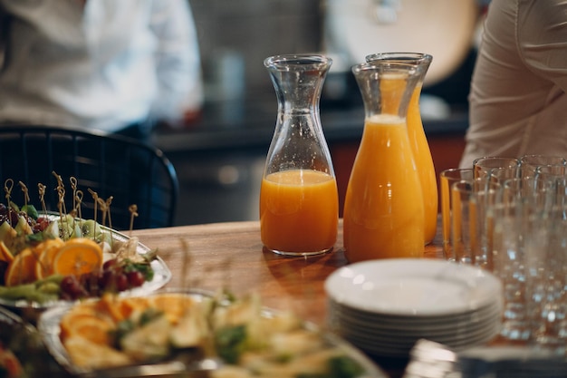 Fruit on a tray. Bottled fruit juice.