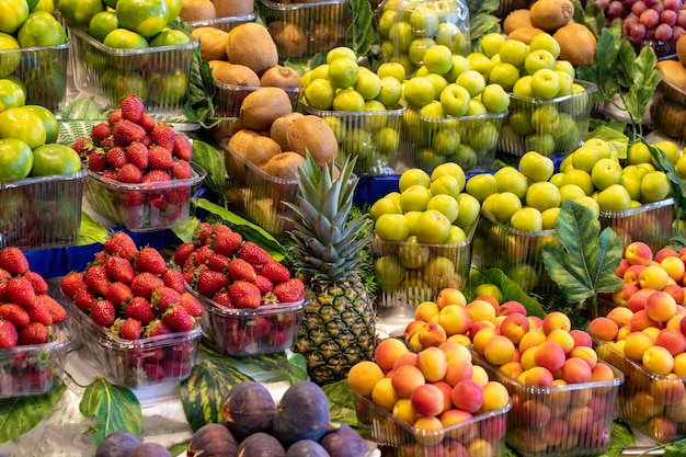 Fruit and vegetable market counter Fresh a variety of fruits lie on the counter in the store