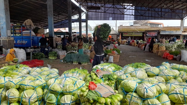 A fruit and vegetable market is shown in this photo.