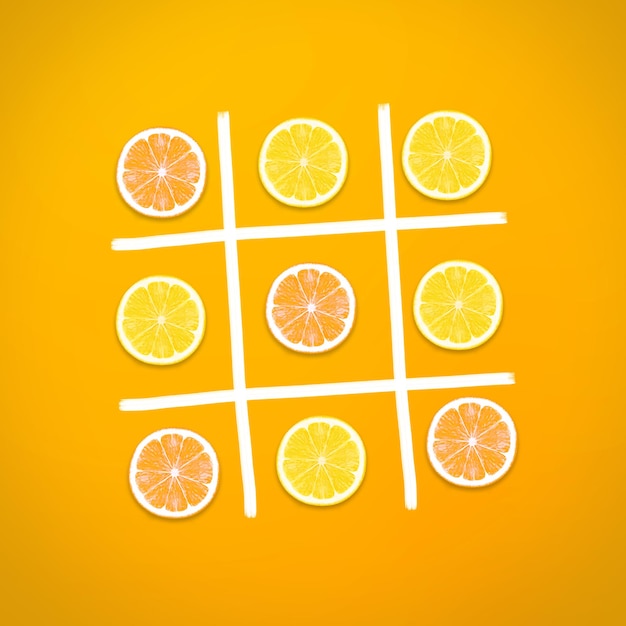 Fruits concept lemon slices on ox game on yellow background